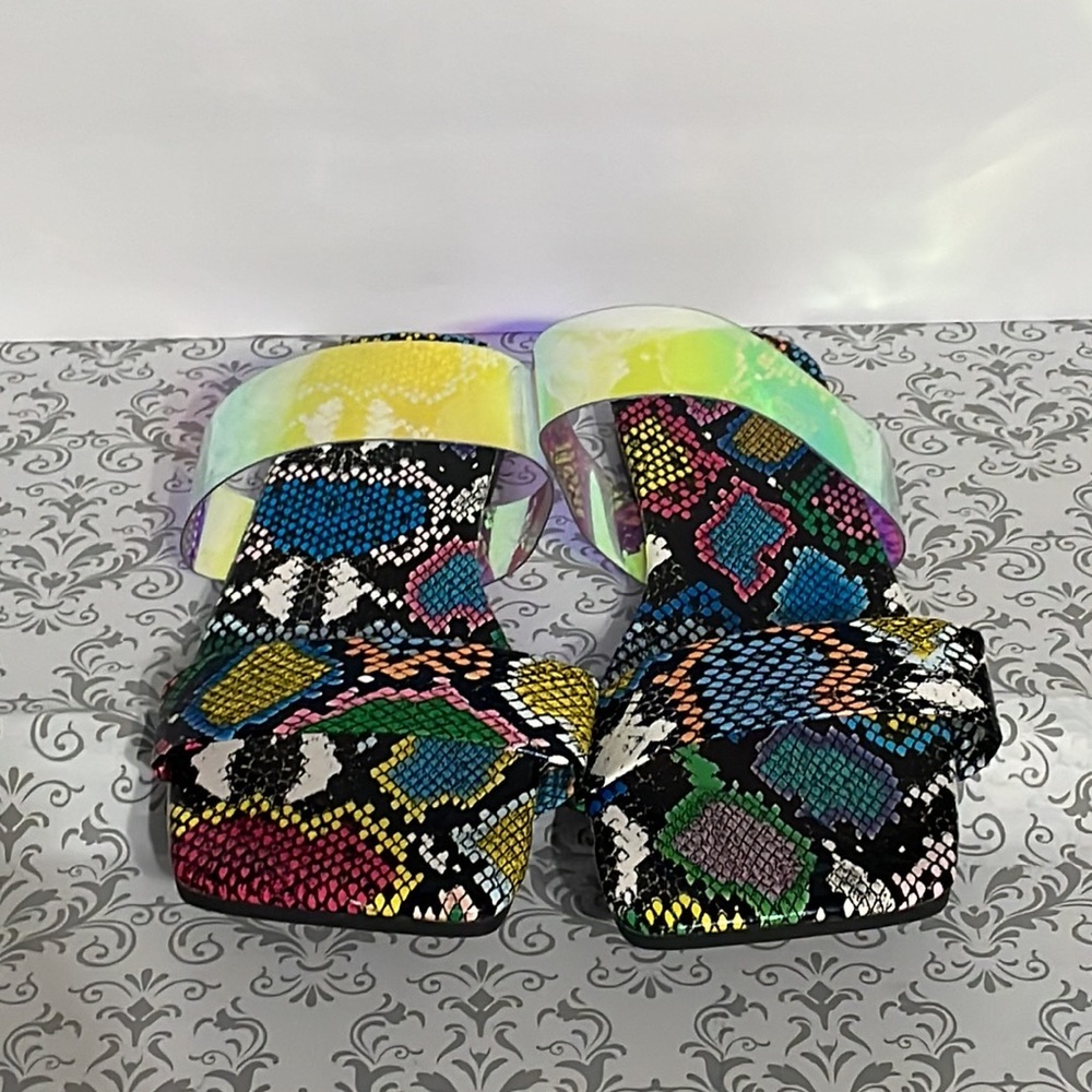 Multi color, double strap, flap sandals.